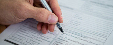 businesswoman filling last will and testament form 2025 04 03 08 28 16 utc