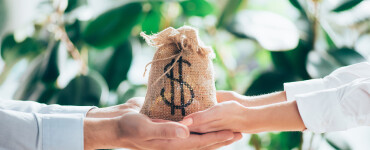 cropped shot of people holding sackcloth bag with 2024 11 17 07 05 34 utc