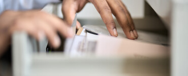 male hands searching corporate documents files in 2025 02 04 04 01 22 utc